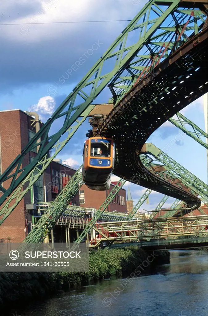 Suspension monorail over river, Wuppertal Schwebebahn, River Wupper, Wuppertal, North Rhine Westphalia, Germany