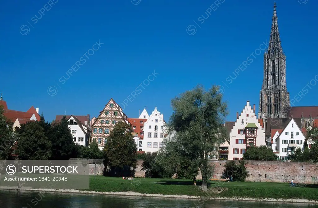 Houses and church against blue sky, Ulm, River Danubia, Baden_Wurttemberg, Germany