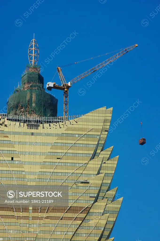 Crane on top of building, Grand Lisboa, Macau, Guangdong Province, China
