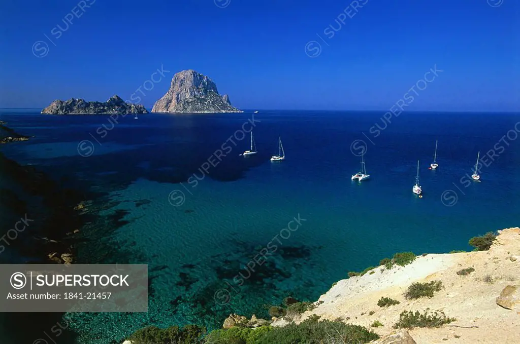 Sailboats moored near coast, Es Vedra, Balearic Islands, Spain