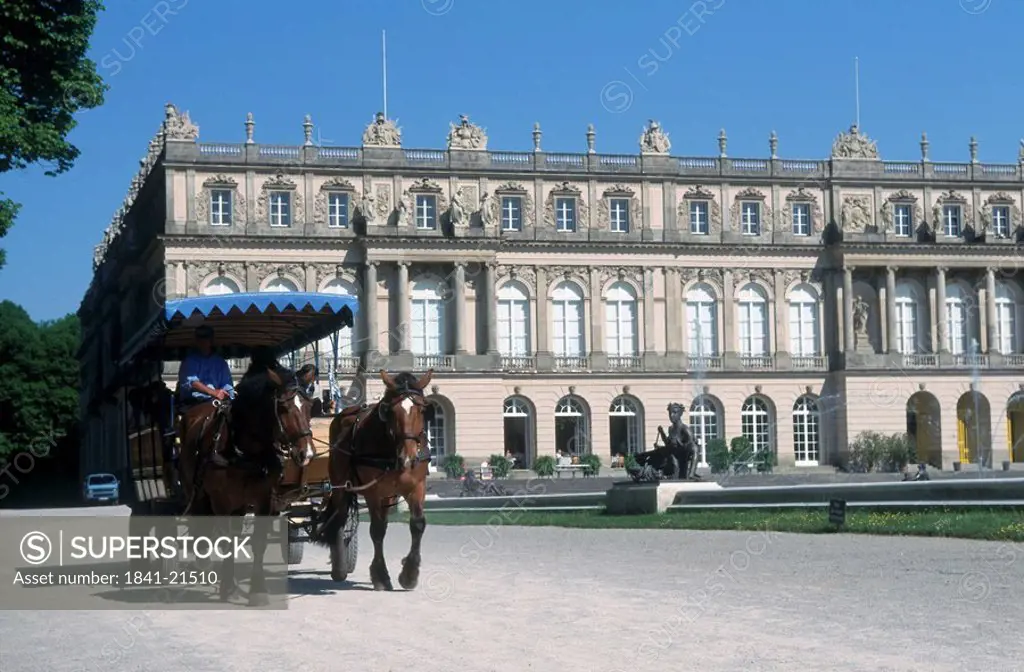 Horsedrawn carriage in front of castle, Herrenchiemsee Castle, Herreninsel, Bavaria, Germany