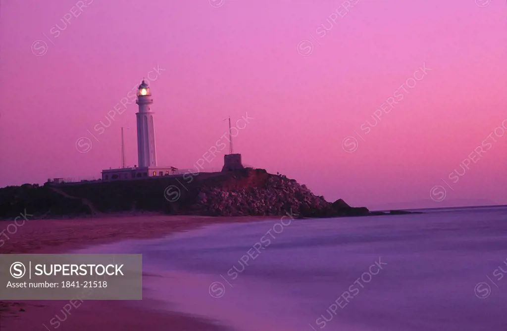 Lighthouse and dusk, Costa de la Luz, Cabo de Trafalgar, Andalusia, Spain