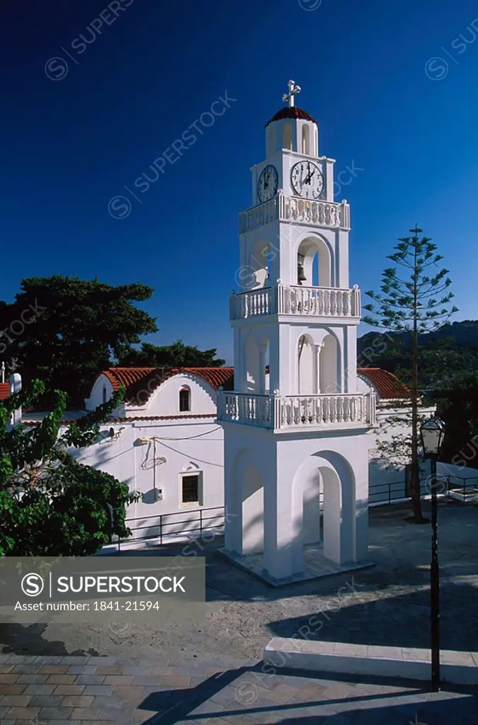 Church clock tower against blue sky, Agias Trias Church, Rhodes, Dodecanese Islands, Greece