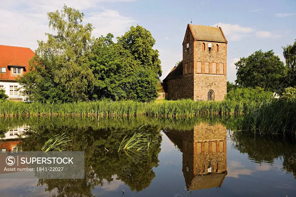 Fieldstone church at a pond in Lindenberg, Ahrensfelde, Germany