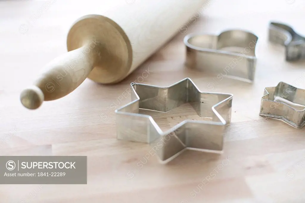 Close_up of pastry cutters and rolling pin