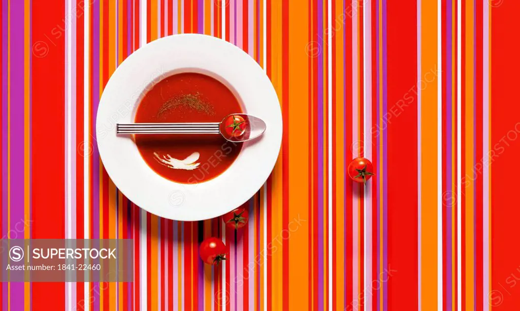 High angle view of tomatoes and a bowl of soup