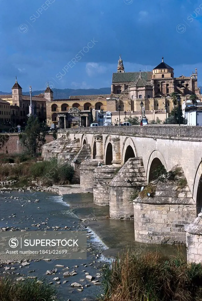 Bridge across river in town, Puente Romano, Cordoba, Roman Bridge, Andalusia, Spain