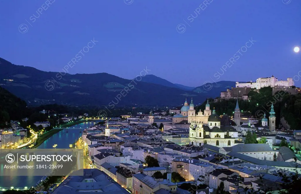 Town with castle in background, Salzach River, Burg Hohenwerfen Castle, Salzburg, Austria
