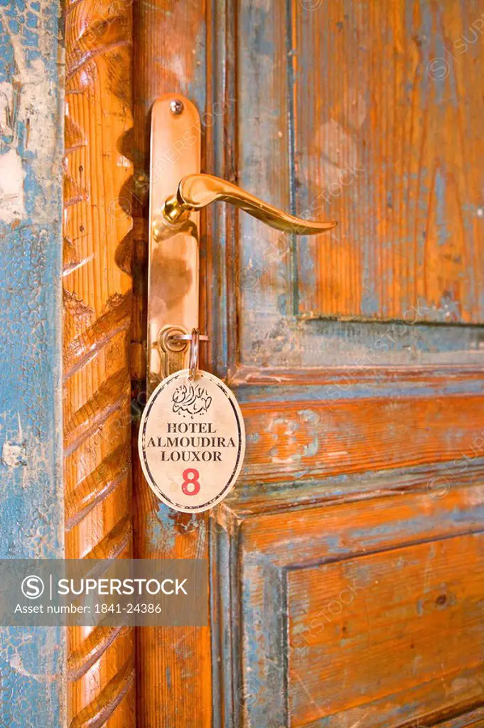 Close_up of key in door lock