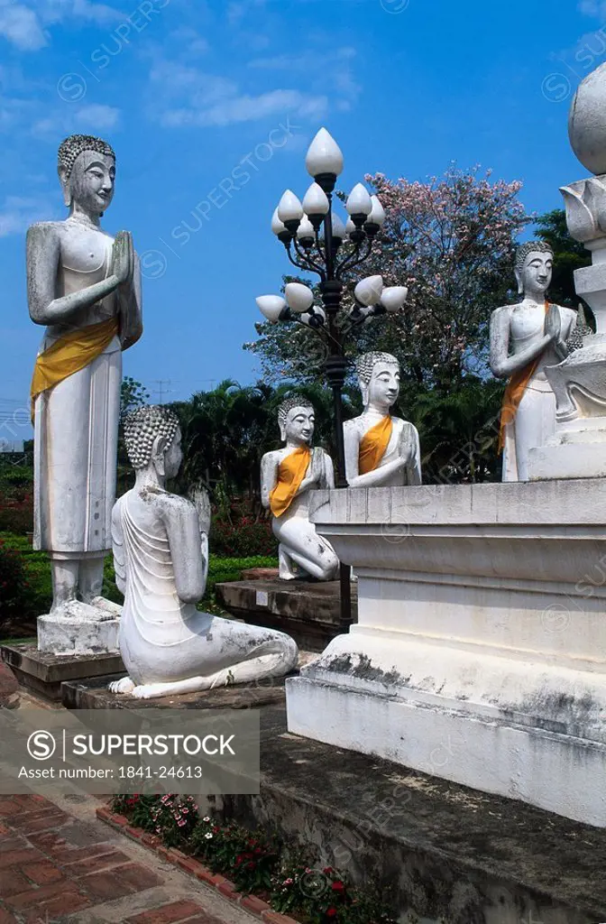 Buddha statues in prayer positions, Wat Yai Chai Mongkol, Ayutthaya, Thailand