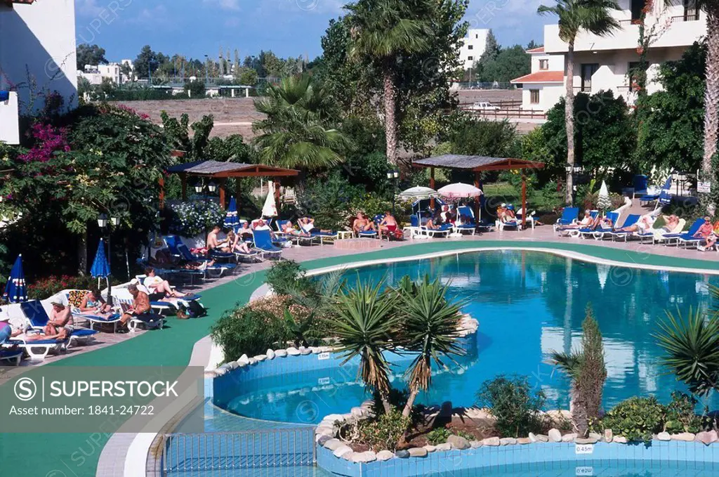 Tourists at poolside, Hotel Theofano, Phaphos, Cyprus