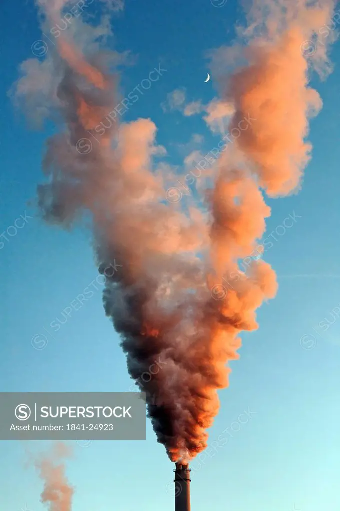 Smoke emitting from chimney