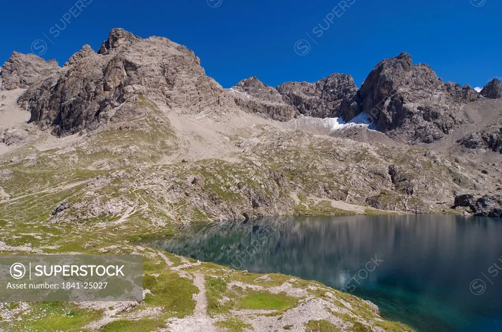 Reflection of mountain in lake, Laserzsee, Lienzer Dolomiten, Tyrol, Austria