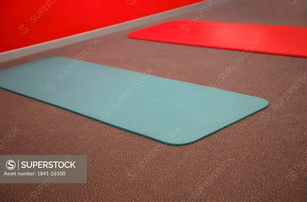Close_up of two exercise mats of yoga