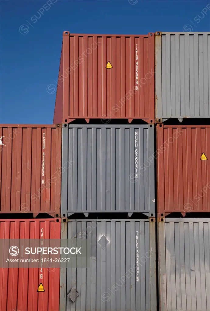 Shipping cargo containers against blue sky