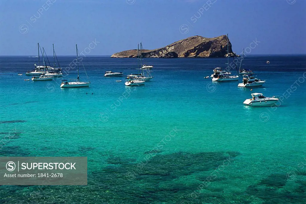 Sailboats moored at coast, Balearic Islands, Spain