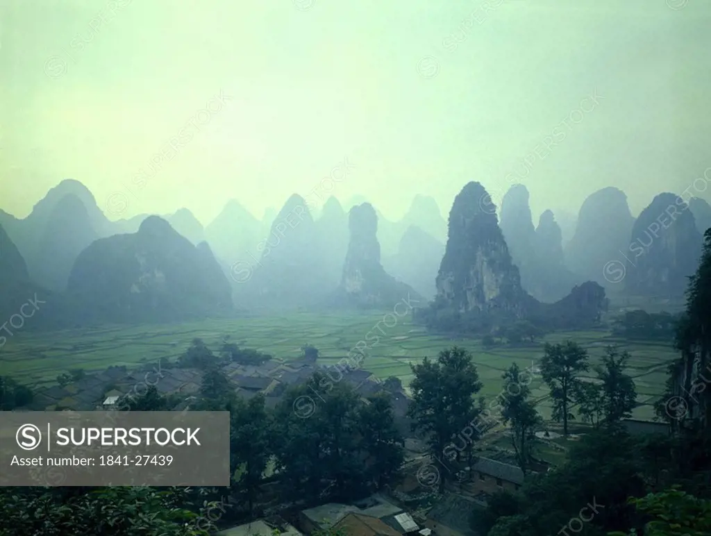 Rock formations on rural landscape, China