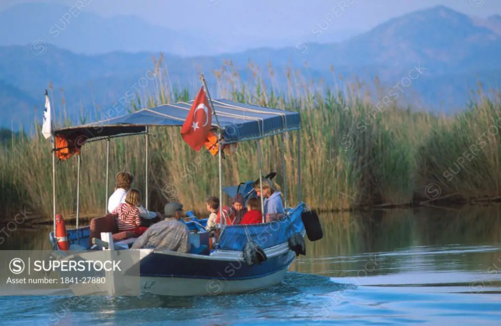Group of people traveling on boat in river, Mugla, Turkey