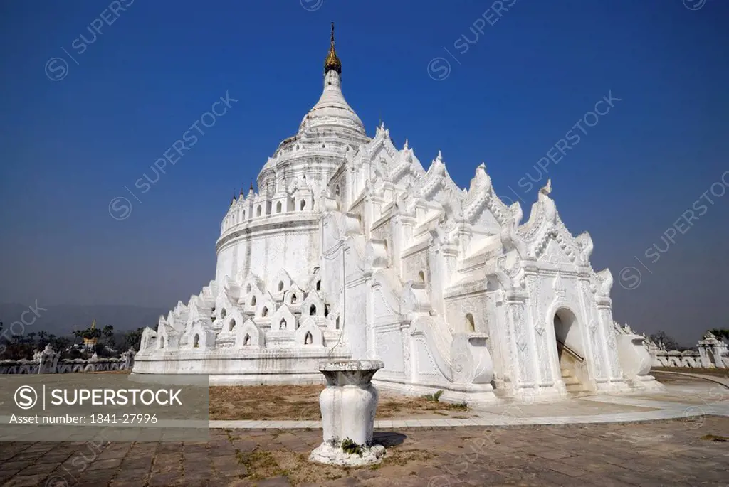 White pagoda against clear blue sky, Hsinbyume pagoda, Amarapura, Myanmar