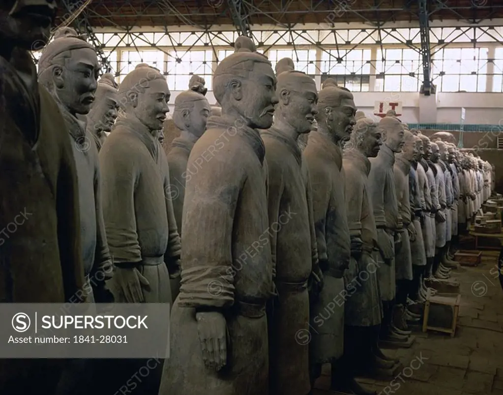 Terracotta soldiers standing in row, Tomb of Qin Shinhuang, Xian, Shaanxi, China