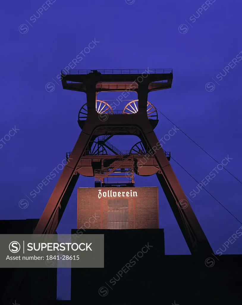 Pulley crane against blue sky at dusk, Germany