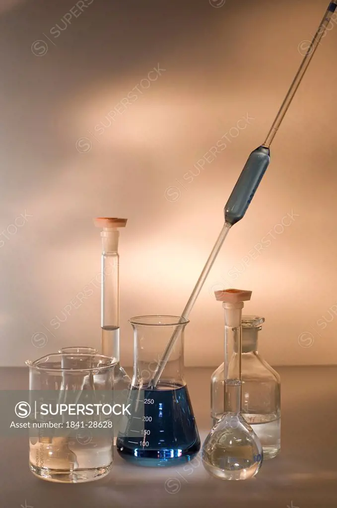 Close_up of beakers and flasks