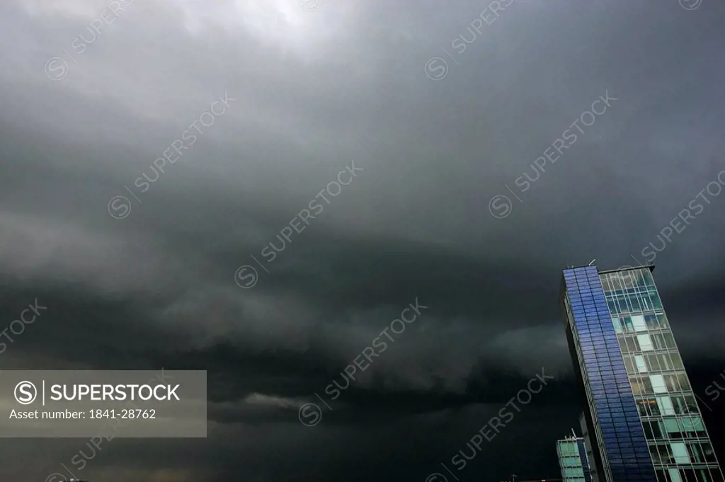 Stormclouds over skyscrapers
