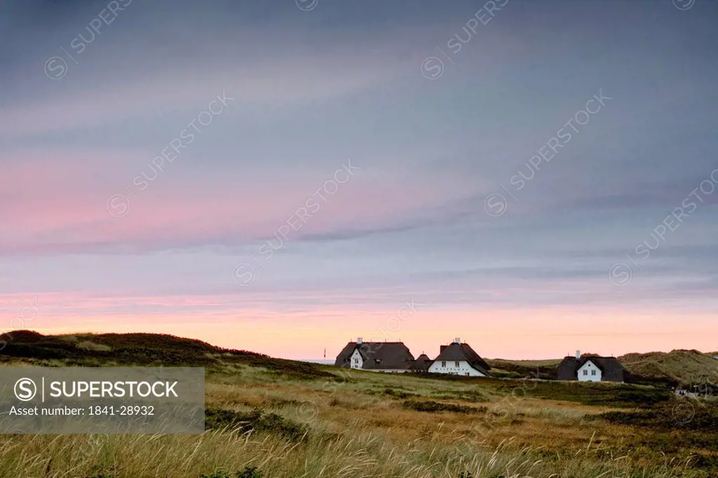 Reed_thatched houses in the dunes of Kampen, Sylt, Germany