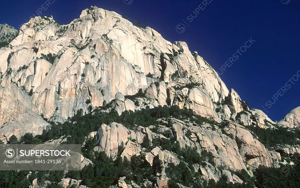 Low angle view of mountain, Bavella, France