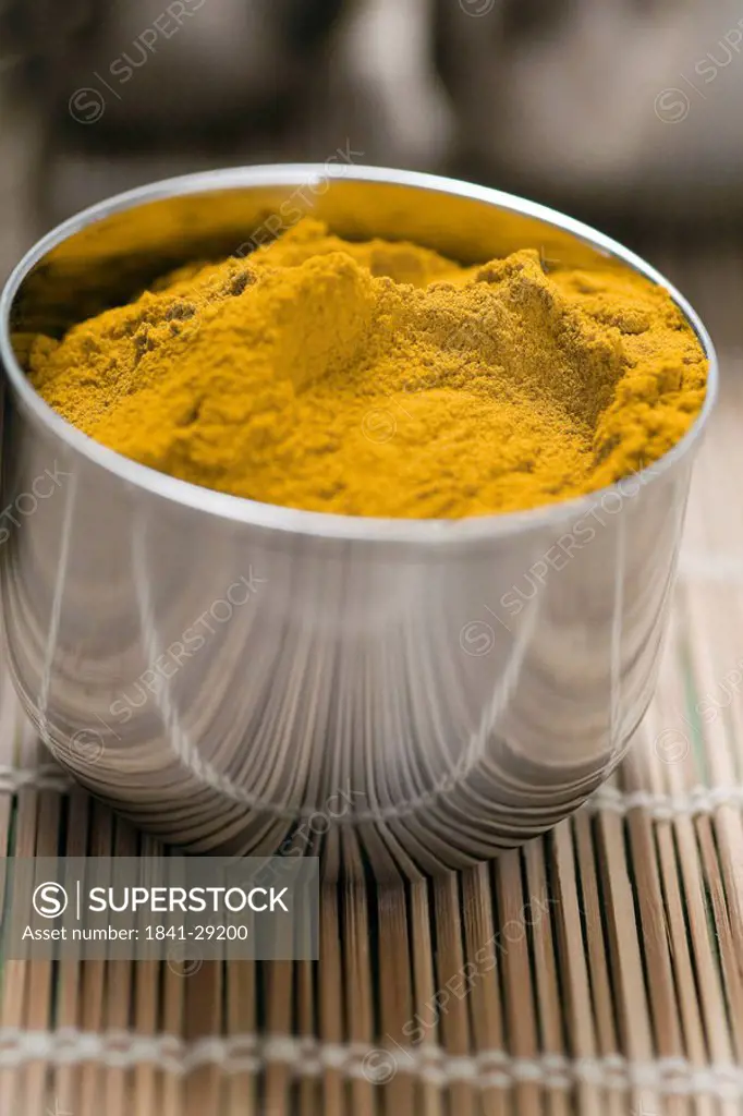 Close_up of turmeric powder in bowl