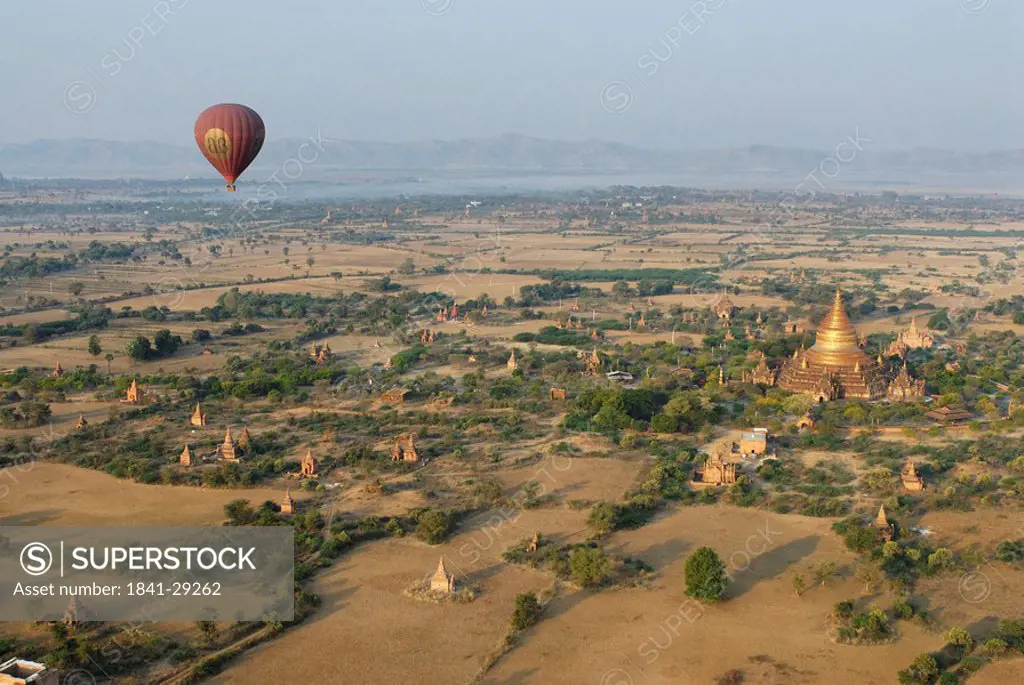 Hot air balloon above Buddhist stupa, Bagan, Myanmar