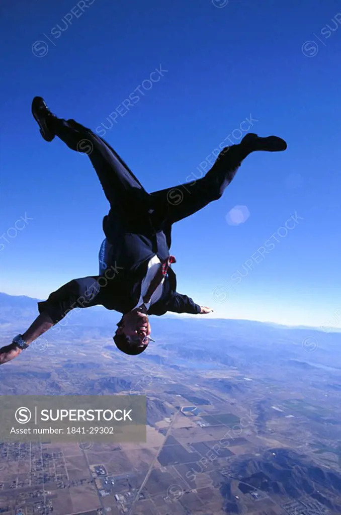 Businessman skydiving
