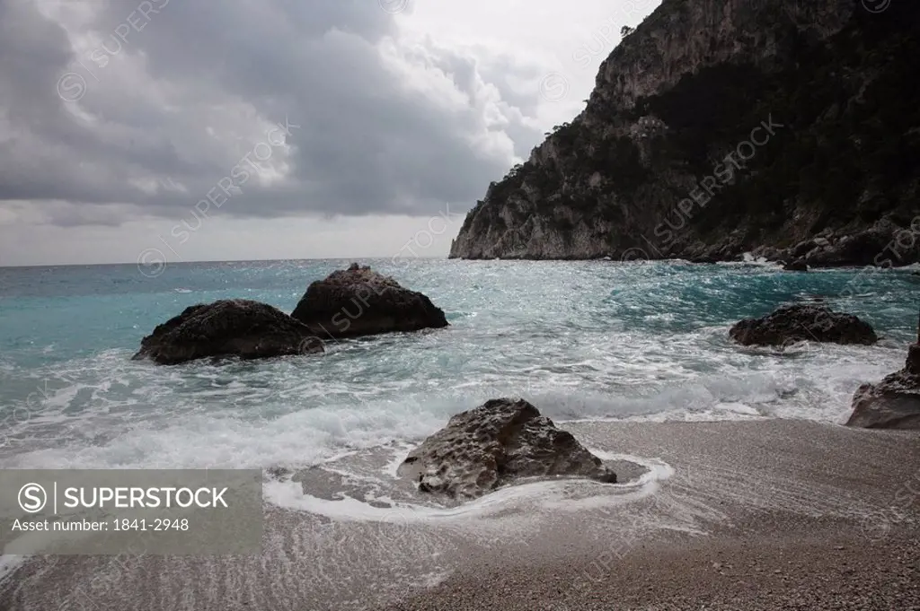 Rock formations on beach, Capri, Campania, Italy