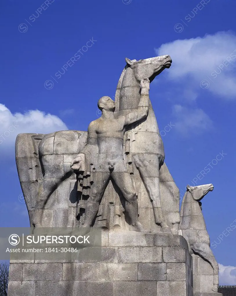 Low angle view of statue against blue sky, Dusseldorf, North Rhine_Westphalia, Germany