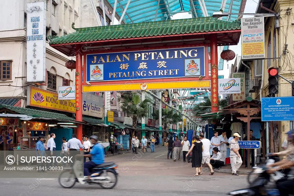 Pedestrians in a shopping street, Chinatown, Kuala Lumpur, Malaysia
