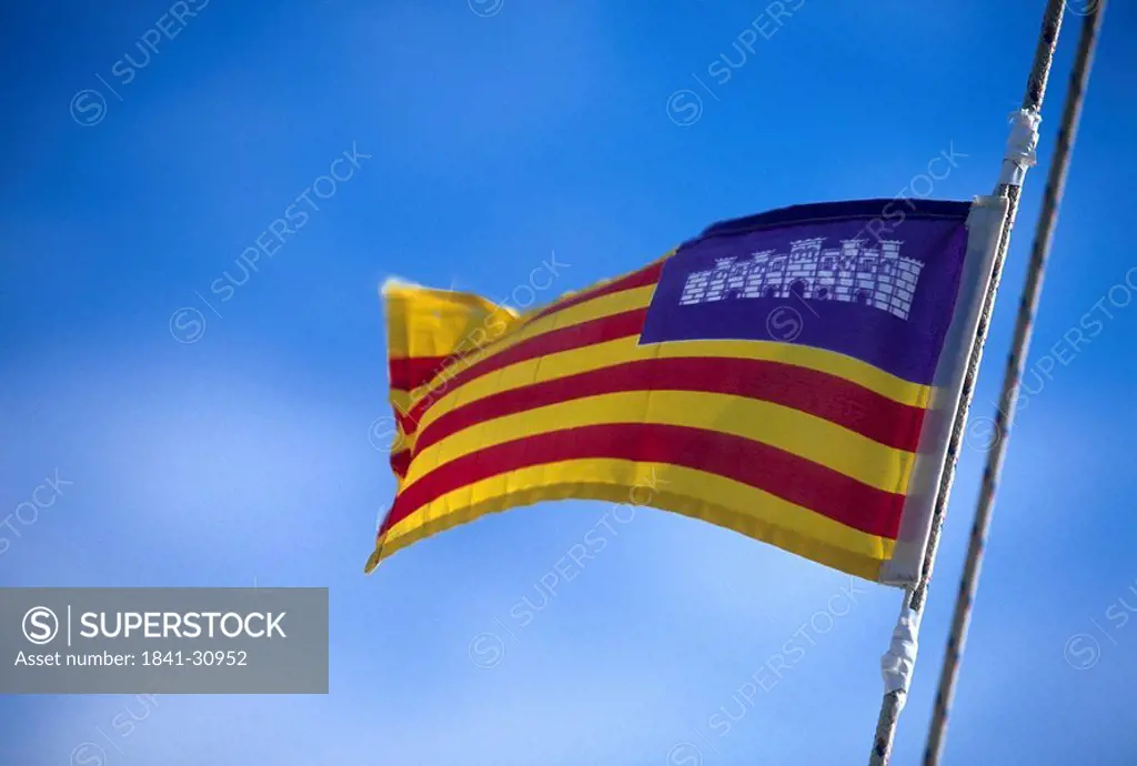 Low angle view of Majorcan flag, Majorca, Spain, Europe