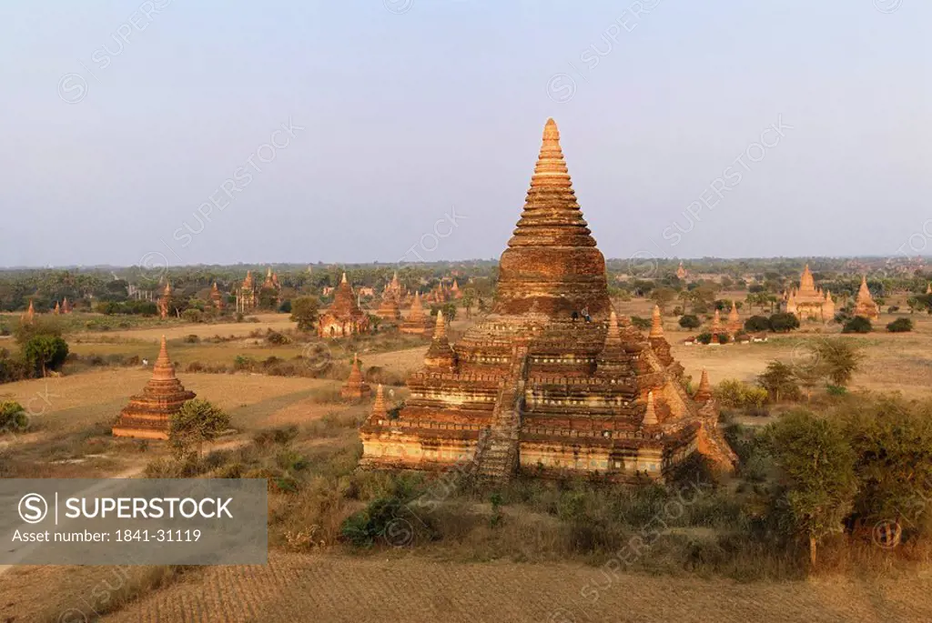 Old pagodas on landscape under clear blue sky, Bagan, Myanmar