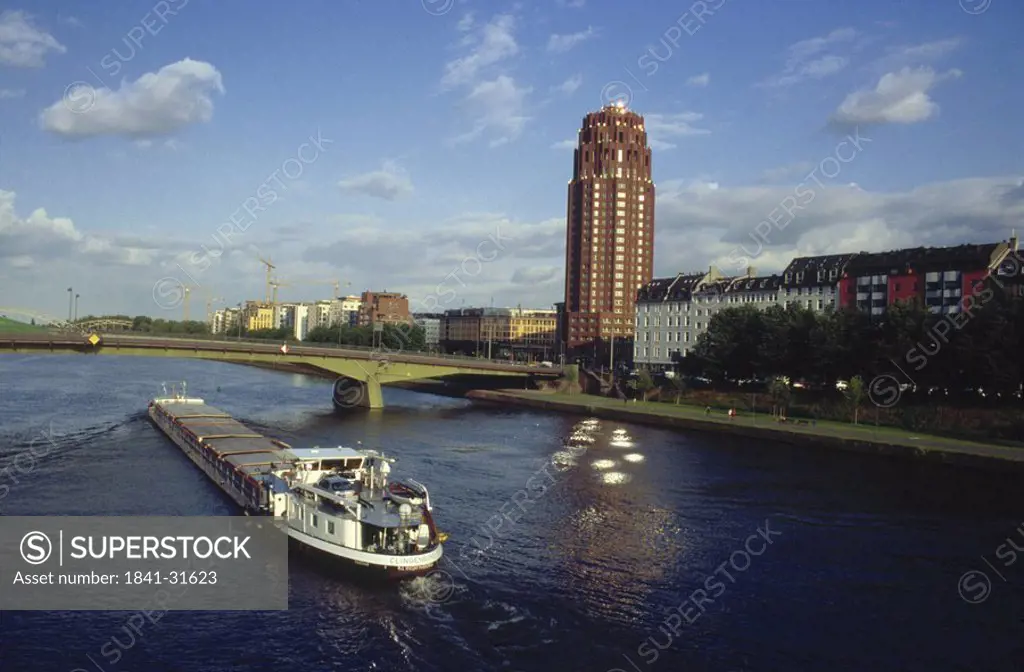 Container ship in river, Main River, Floesserbruecke Bridge, Frankfurt, Germany
