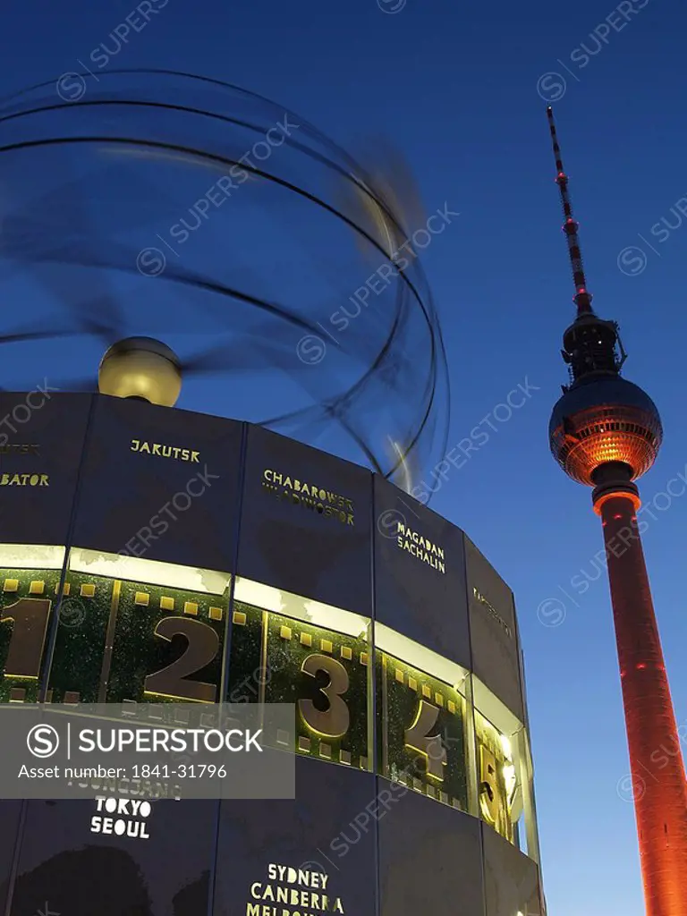 Low angle view of clock and communication tower, Urania World Clock, Fernsehturm, Berlin, Germany