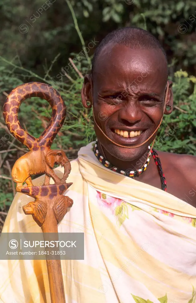 Massai with stick, Kenya