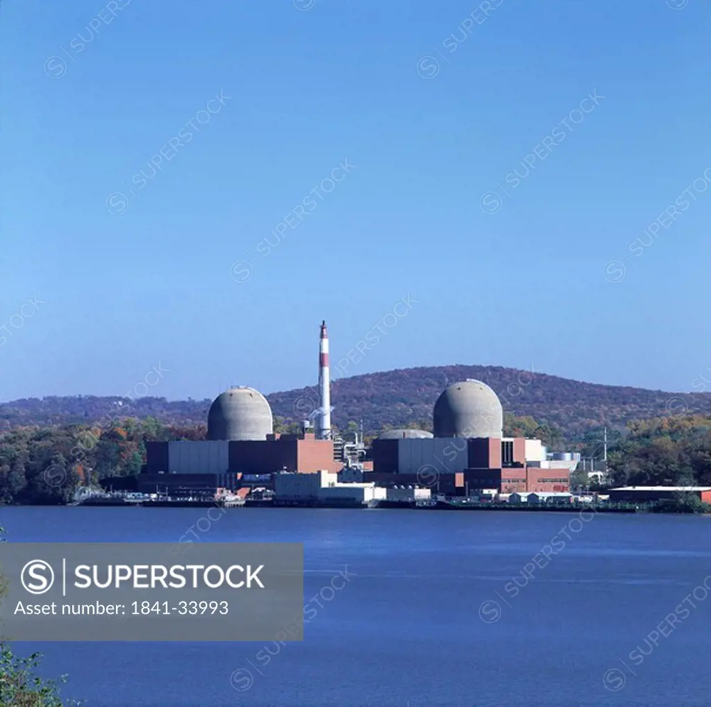 Nuclear power plant station at waterfront, Indian Point Energy Center, Hudson River, New York State, USA