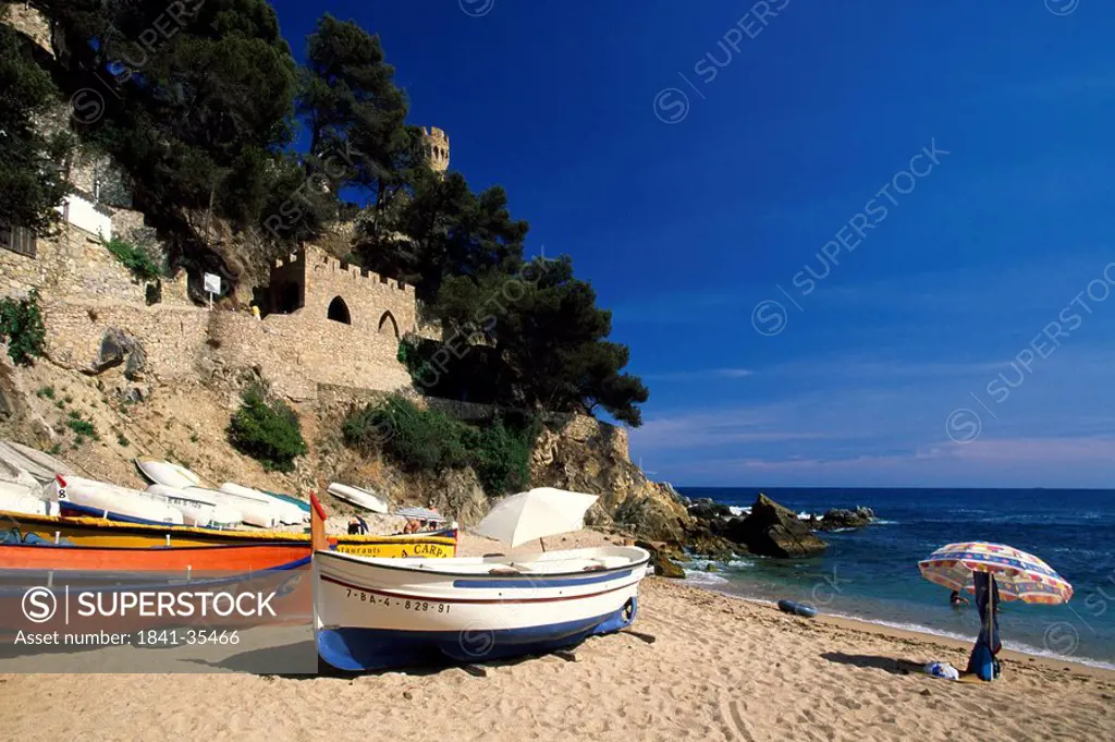Boats on beach, Lloret de Mar, Girona Province, Catalonia, Spain