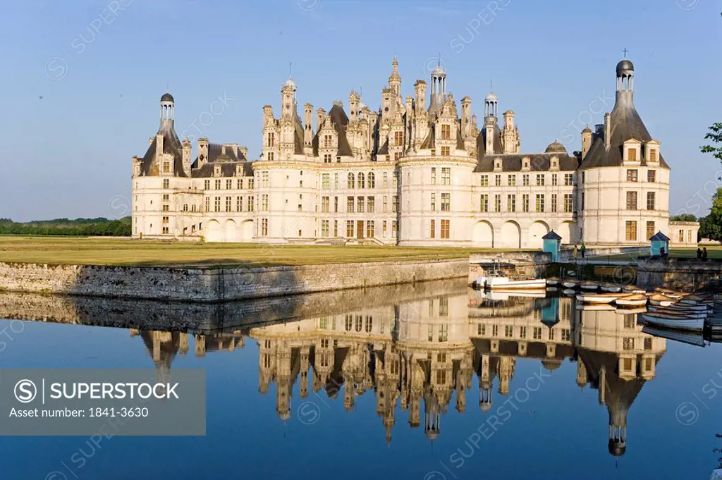 Reflection of castle in water, Chateau De Chambord, Chambord, Loir_Et_Cher, France