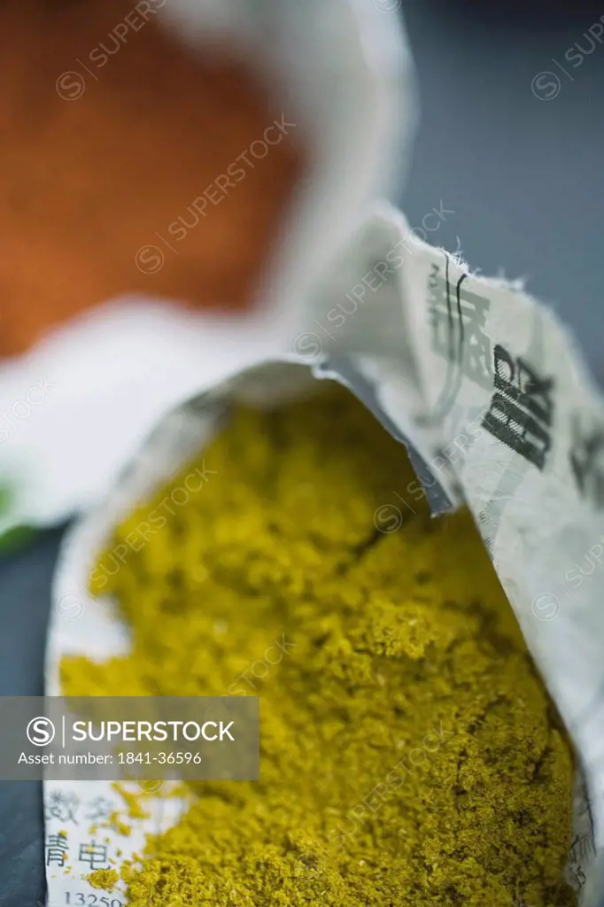 Close_up of coriander powder on paper