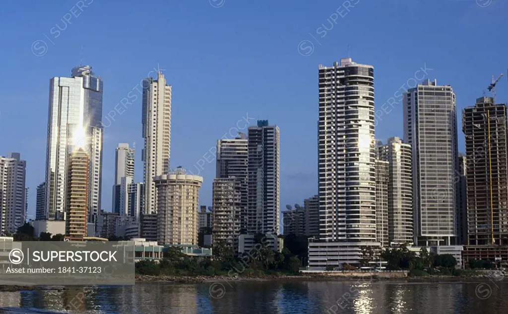 Buildings at waterfront against blue sky, Panama
