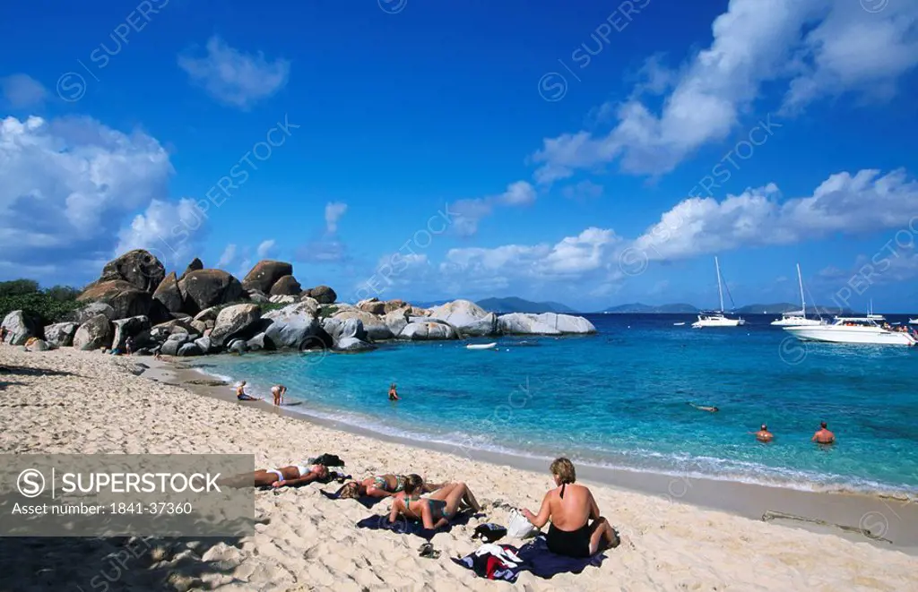Tourists on the beach, The Baths, Virgin Gorda, British Virgin Islands