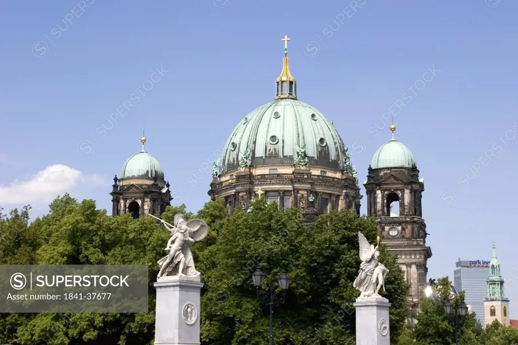 Statues in front of church, Deutscher Dom, Gendarmenmarkt, Berlin, Germany
