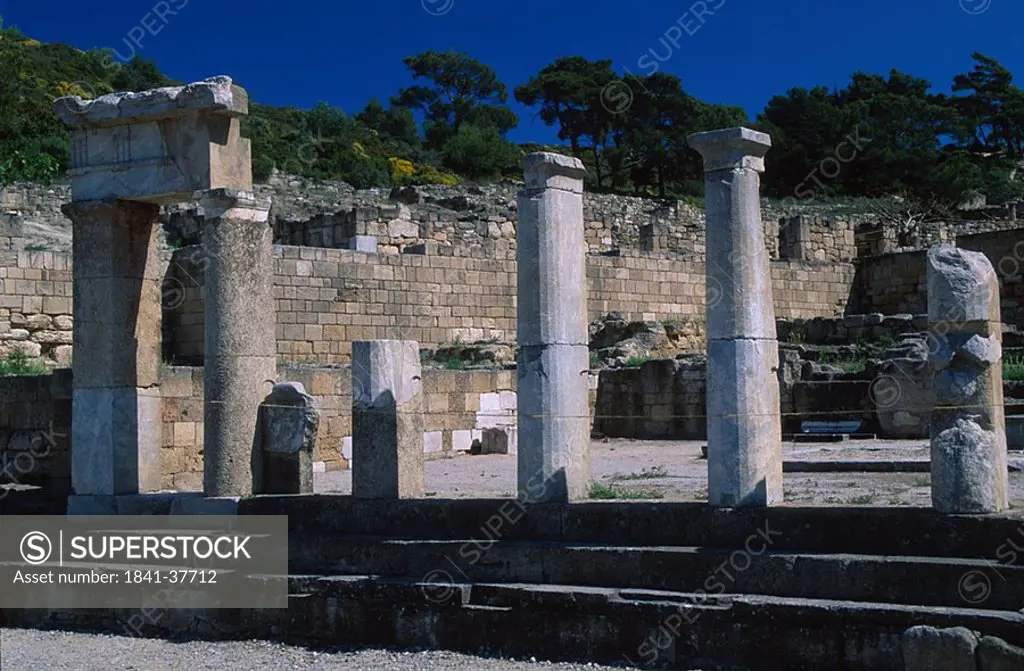 Broken columns at old ruins of building, Rhodes, Dodecanese Islands, Greece