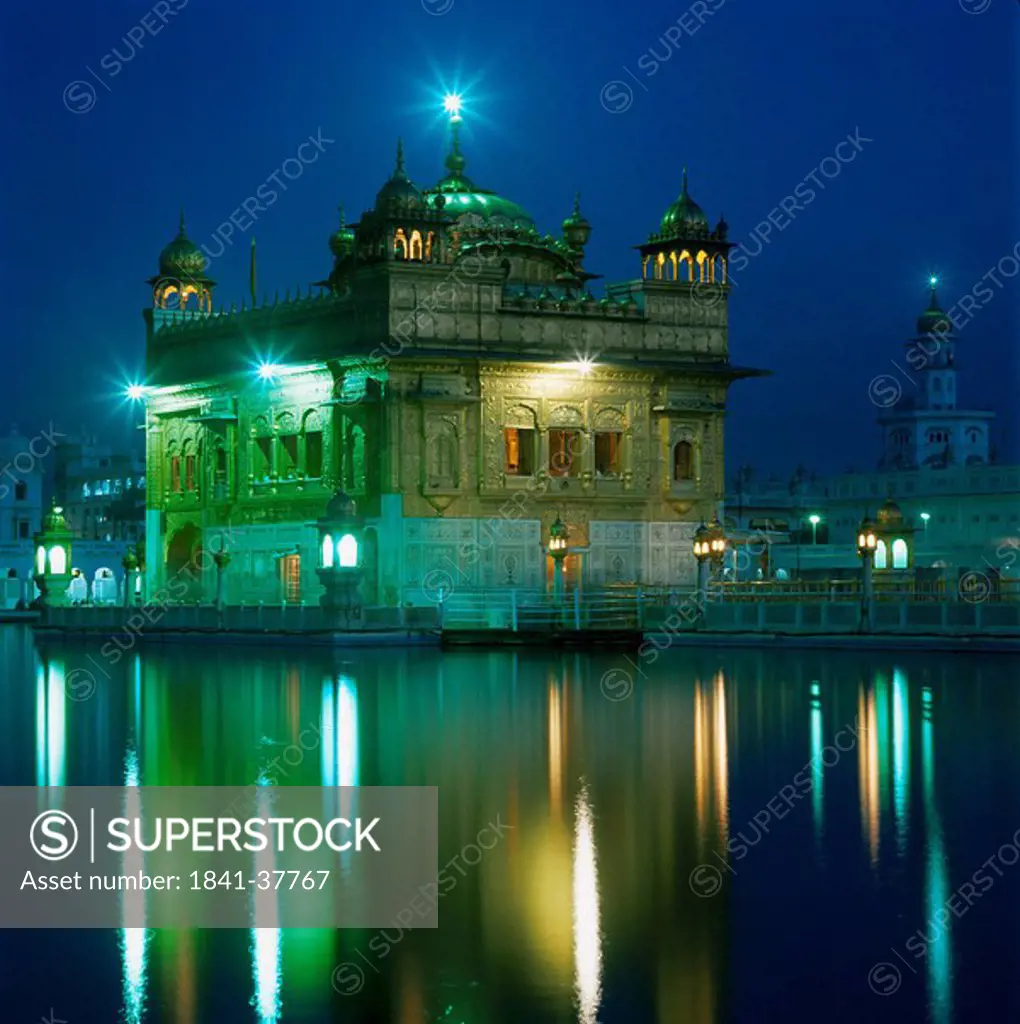 Gurdwara lit up at night, Harmandir Sahib, Amrit Sovar, Amritsar, Punjab