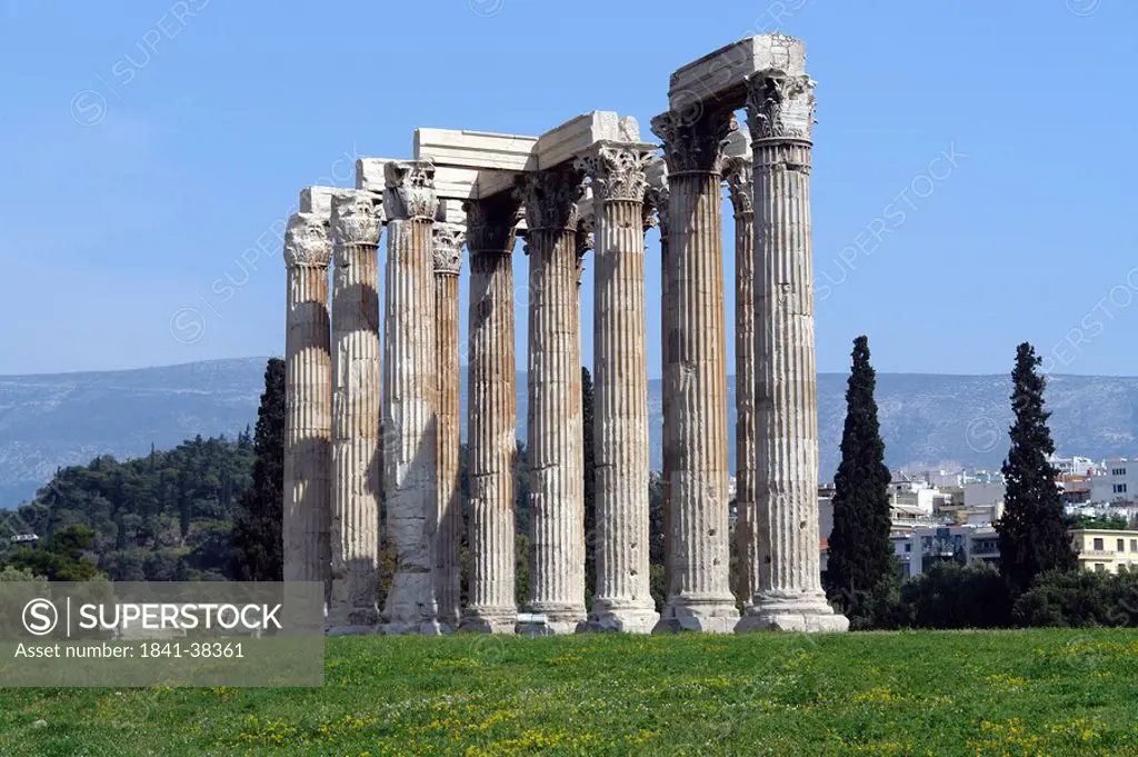 Ancient columns of old ruins on landscape, Temple of Zeus, Athens, Greece